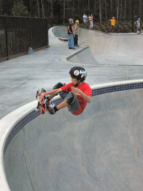 Young Chris Coffman ollies into a frontside air