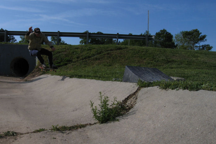 Andy Birdwell frontside ollie 360...that's right...land fakie!