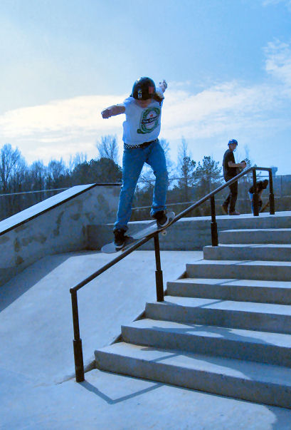 Michael Smith grinds a nice feeble down the 8-stair rail