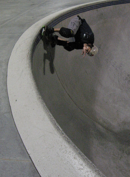 Alf pulls an under coping backside Indy