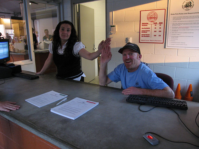 Mrs. Coffman and Raymondo at the front desk