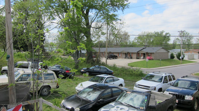yard transformed into a parking lot
