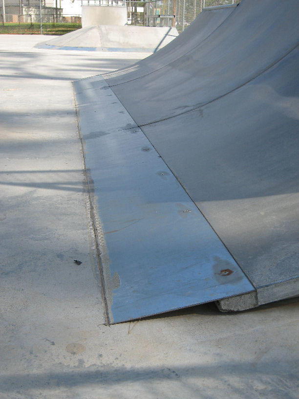 Bottom of all ramps...steel set into slab